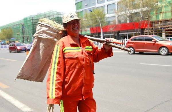 Grinning faces on World Smile Day