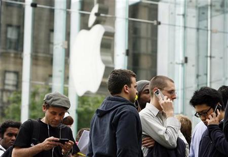 Apple working on digital albums, tablet PC: sources