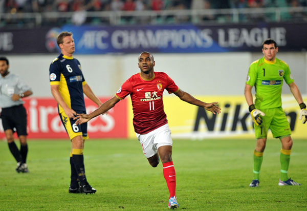 Muriqui (11) of Guangzhou Evergrande celebrates after a goal against Central Coast Mariners of Australia during their second leg of the Asian Champions League last 16 game in Guangzhou, on May 22, 2013. Evergrande, again, into AFC quarterfinals
