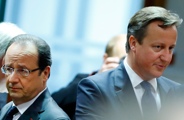 British Prime Minister David Cameron (right), and French President Francois Hollande at a European Union summit in Brussels on Friday. Yves Herman / Associated Press EU leaders pledge to tackle unemployment crisis